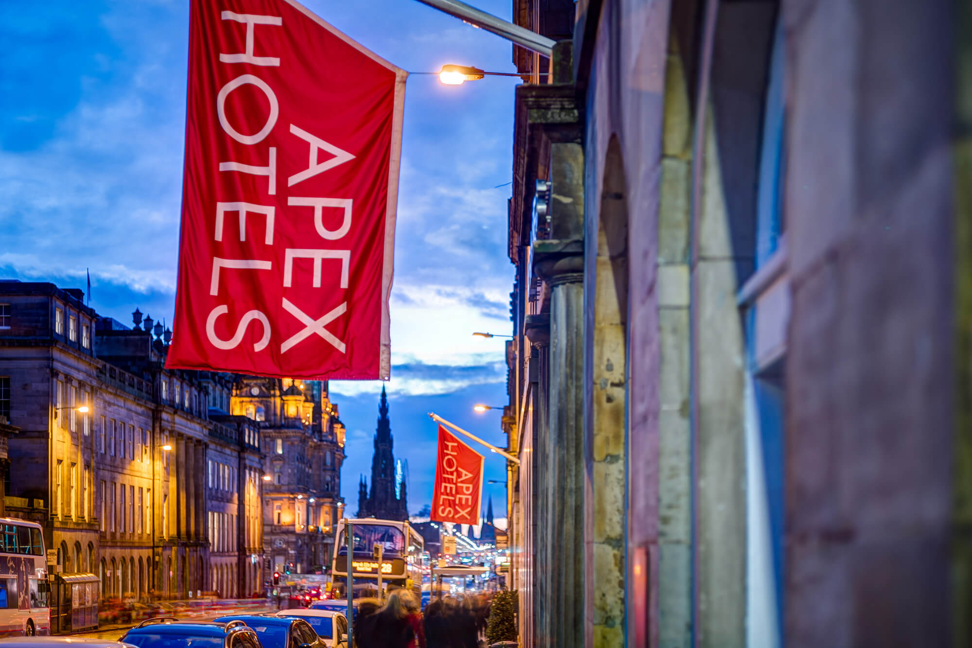 Exterior of Apex Waterloo Place Hotel with red Apex Hotels flag