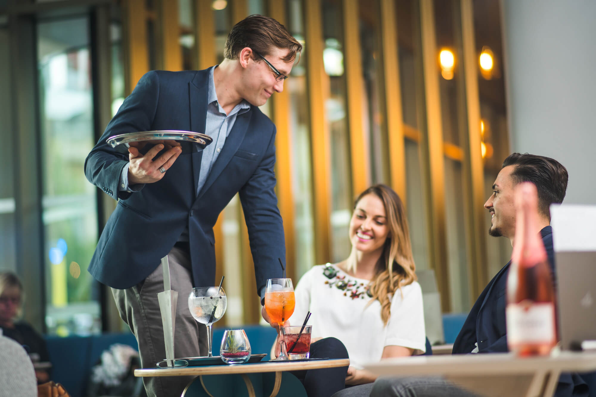 Guests being served drinks Guests being served drinks