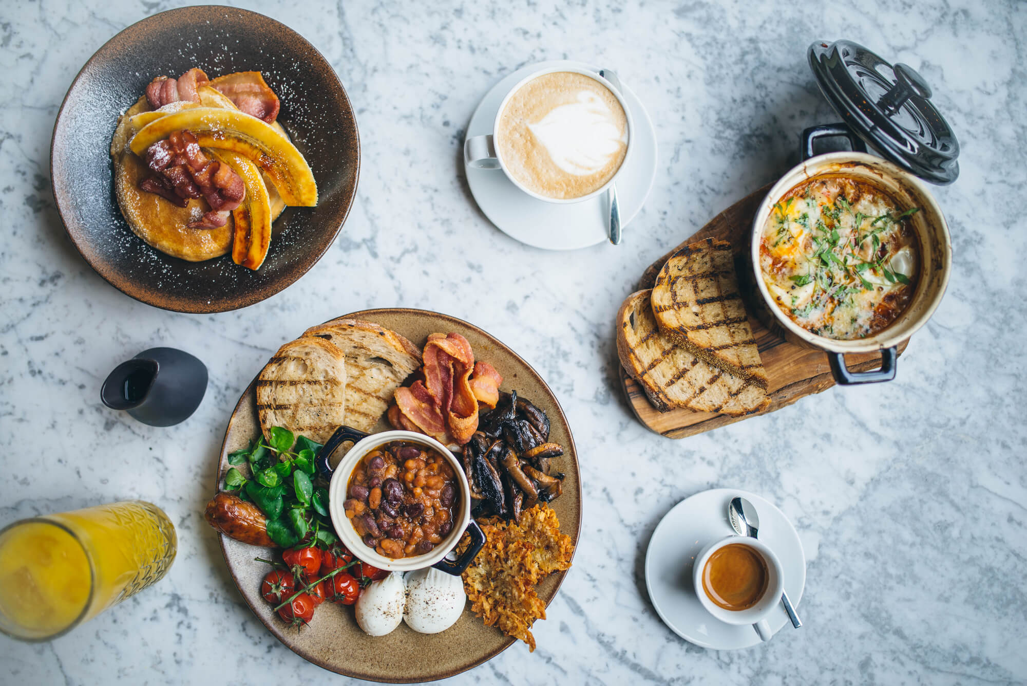 Breakfast dishes on marble table