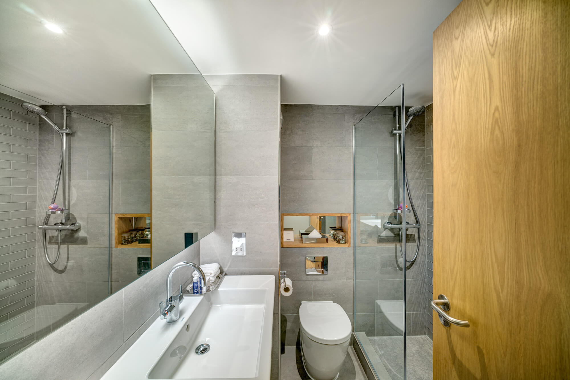 Family Room bathroom with walk-in shower and sink