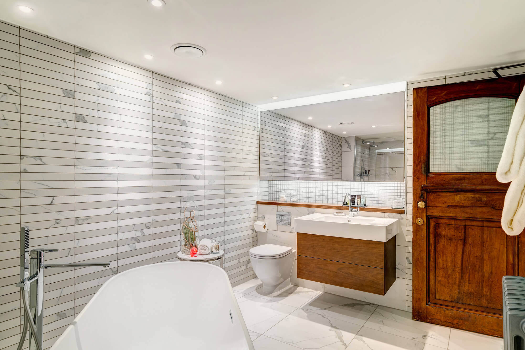 Grand Suite bathroom with freestanding bathtub at Apex Temple Court Hotel