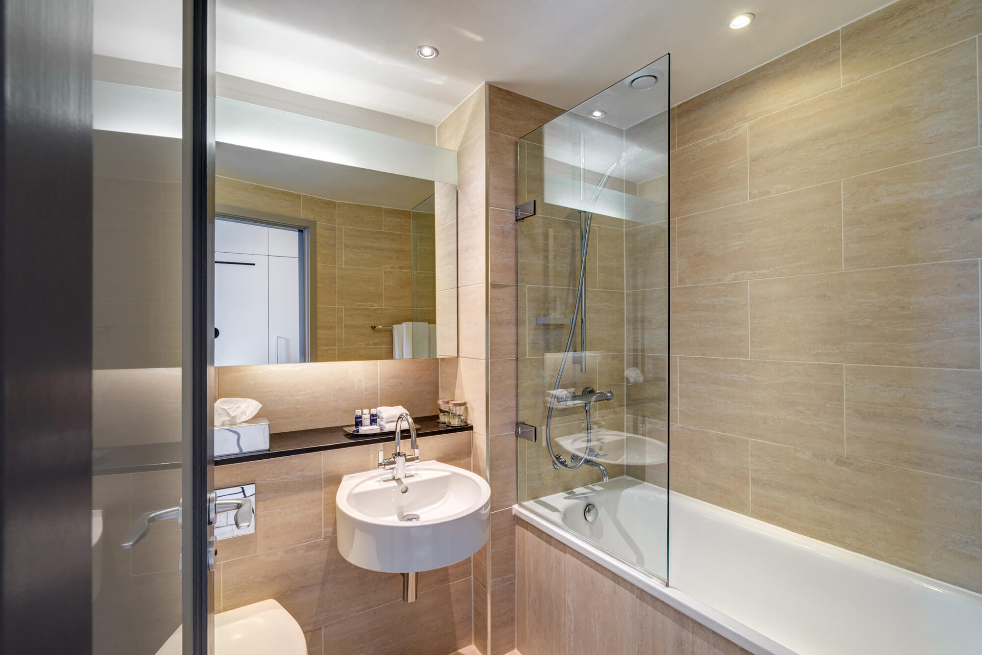 City Room bathroom with shower over bath at Apex Grassmarket Hotel