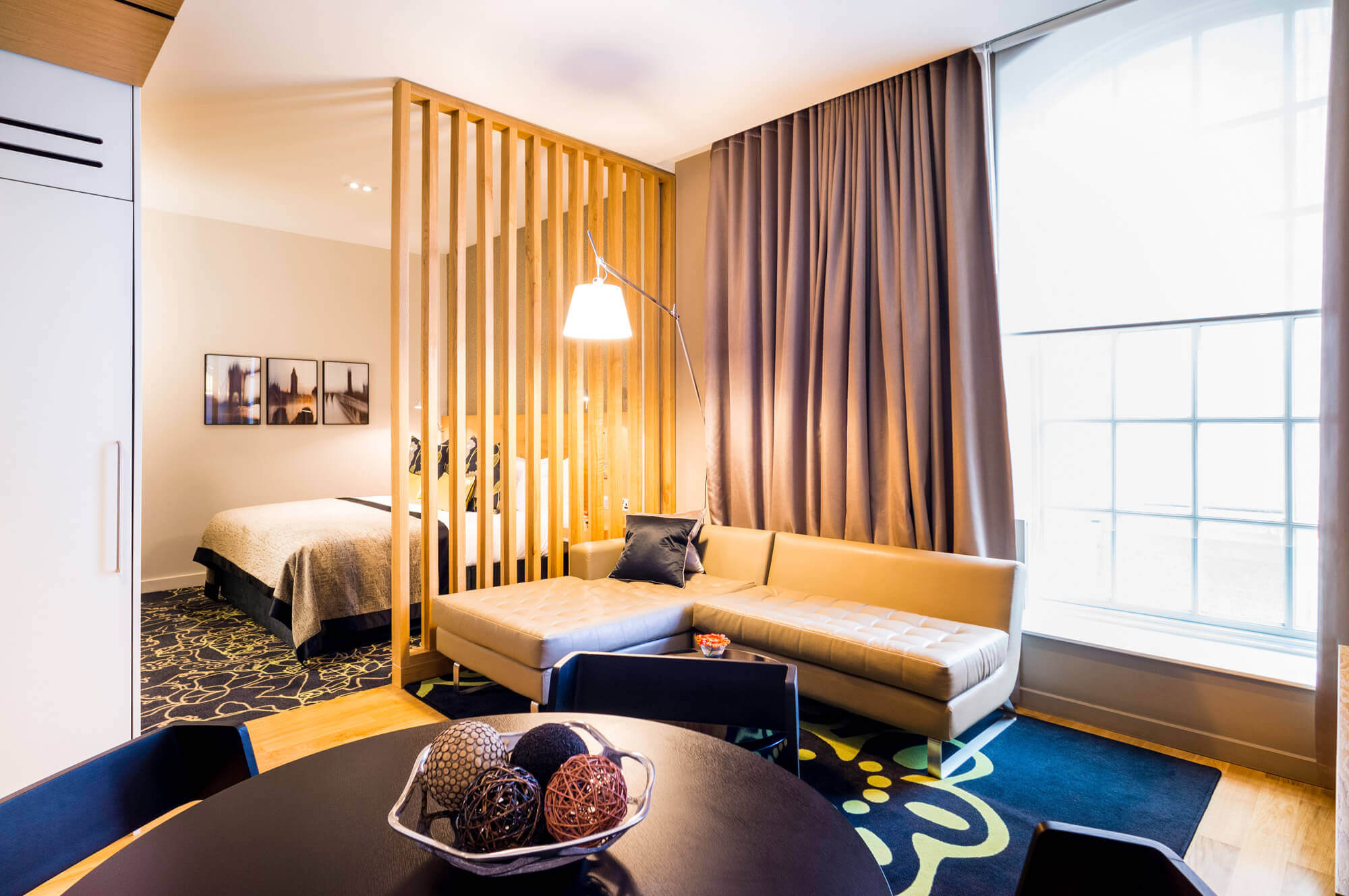 Living area with sofa in Junior Suite at Apex Temple Court Hotel